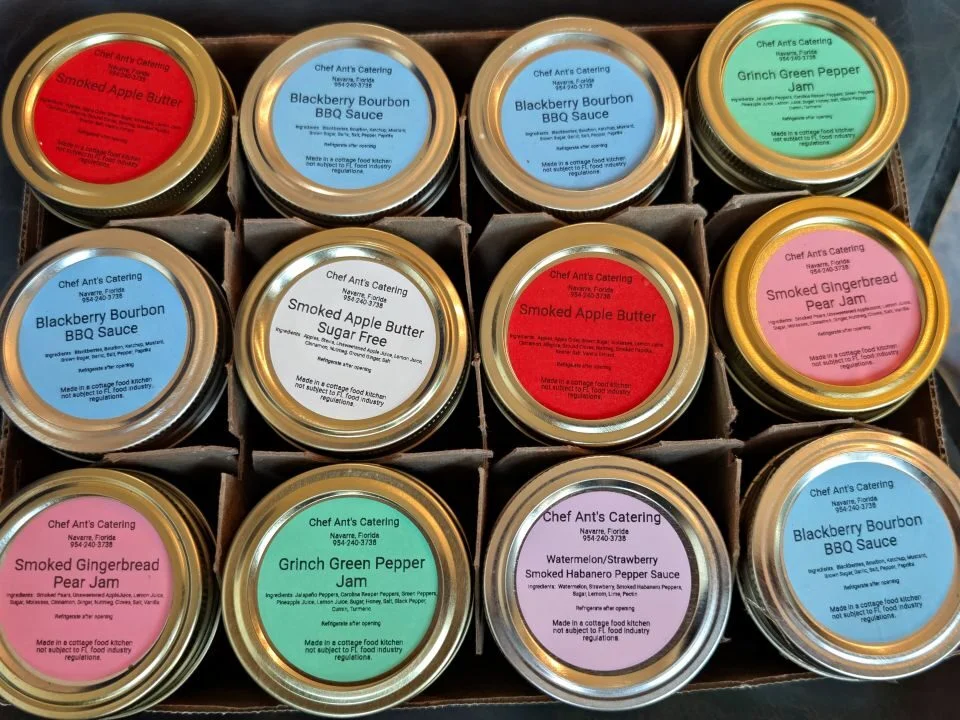 Assorted jams and BBQ sauces.